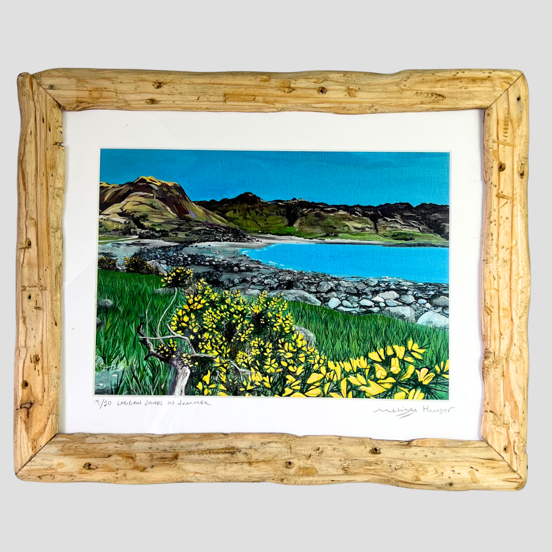 A framed landscape art print depicting gorse flowsers and Laggan sands beach in Lochbuie, on the Isle of Mull. This unique painting is by Melissa Humber- a local artist